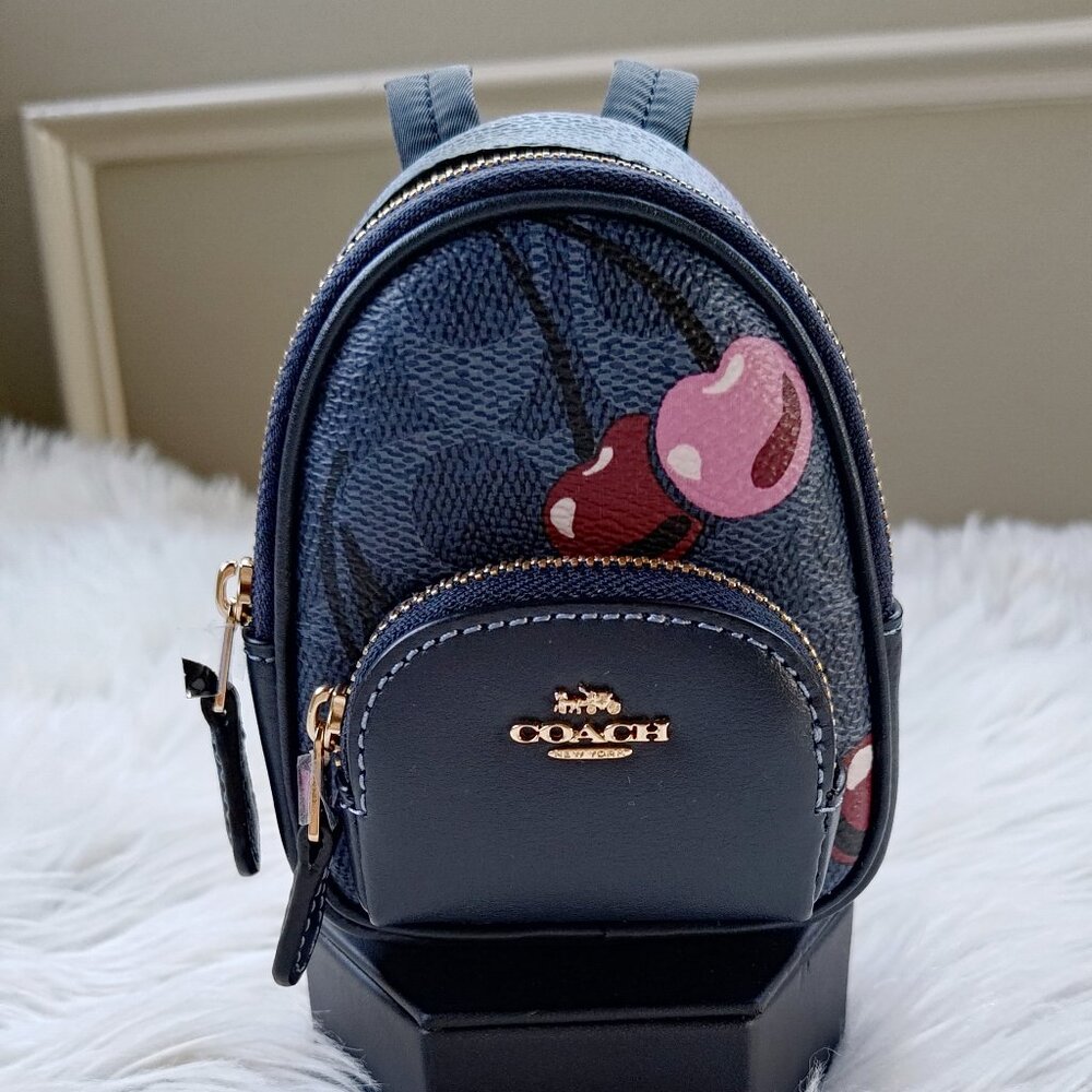 Coach Mini Court Backpack Bag Charm In Signature Canvas With Cherry Print CZ086